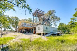 a house being constructed with a tower on top of it at Home Near Beach in Alligator Point Rooftop Deck! in Sun N Sand Beaches