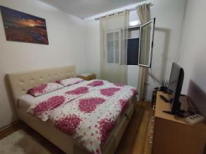 Postel nebo postele na pokoji v ubytování Bgd apartman