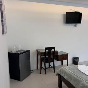 TV in/ali zabaviščno središče v nastanitvi Hotel Naralit