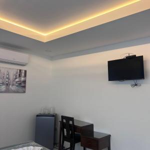 TV in/ali zabaviščno središče v nastanitvi Hotel Naralit
