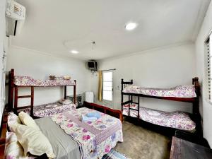 Ένα ή περισσότερα κρεβάτια σε δωμάτιο στο Pousada Recanto da Fonte