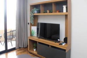 TV a/nebo společenská místnost v ubytování Moderno Depto en Carmelitas