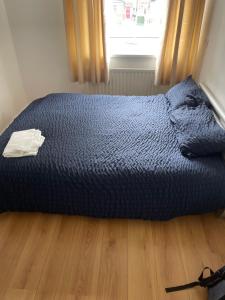 Ένα ή περισσότερα κρεβάτια σε δωμάτιο στο Bettys warm haven
