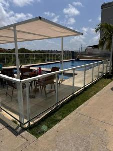 Bazén v ubytování Apartamento304 nebo v jeho okolí