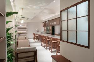 昆明市呈贡区椿屿岚酒店 Chun Yulan Hotel的休息区