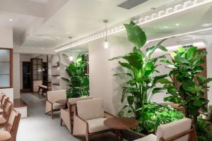 昆明市呈贡区椿屿岚酒店 Chun Yulan Hotel的休息区