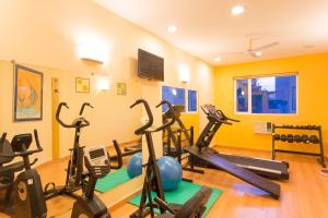 a gym with several exercise bikes in a room at Ginger Pune - Pimpri in Pune