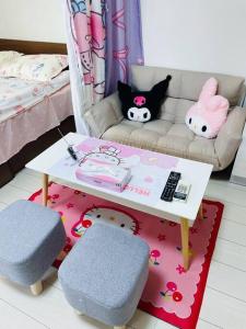 Postel nebo postele na pokoji v ubytování 糖果屋 岸里玉出
