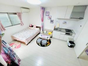 Kuchyň nebo kuchyňský kout v ubytování 糖果屋 岸里玉出