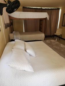 Postel nebo postele na pokoji v ubytování Eco hotel Torino