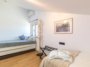 Ένα ή περισσότερα κρεβάτια σε δωμάτιο στο Chiemgauloft Comfortable holiday residence