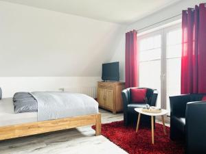 TV a/nebo společenská místnost v ubytování Rügen-Lancken-Granitz