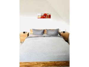 Postel nebo postele na pokoji v ubytování Rügen-Lancken-Granitz