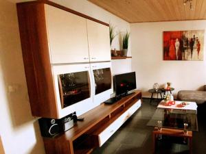 Μια τηλεόραση ή/και κέντρο ψυχαγωγίας στο Sandburg Comfortable holiday residence