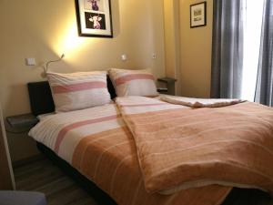 Voodi või voodid majutusasutuse Dat Diekhus Comfortable Holiday Residence toas