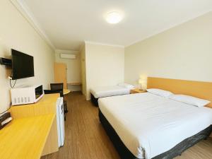 TV a/nebo společenská místnost v ubytování Dandenong Motel