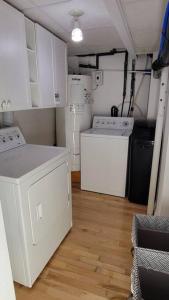 Cuisine ou kitchenette dans l'établissement Chalet Ô Lac-Brome, 3ch, 8 personnes