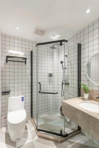 Koupelna v ubytování 厦门半山伴宿民宿-厦大植物园南门店