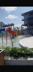 a water park with a playground with a slide at Porto de Galinhas Muro Alto in Porto De Galinhas