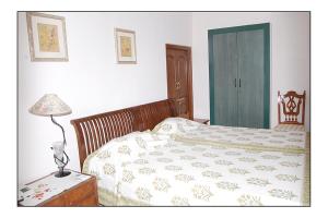 Letto o letti in una camera di Rawla Rawatsar
