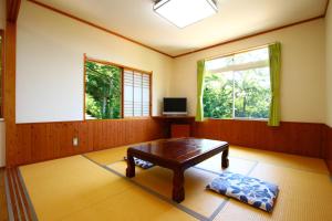 Fotografie z fotogalerie ubytování 紺碧の海眺望の絶景宿コートロシューズ v destinaci Matsuzaki
