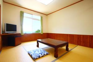 Fotografie z fotogalerie ubytování 紺碧の海眺望の絶景宿コートロシューズ v destinaci Matsuzaki