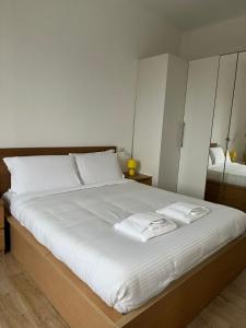 Postel nebo postele na pokoji v ubytování L'Archè Comfort & Relax Niguarda House + 13 fotografií