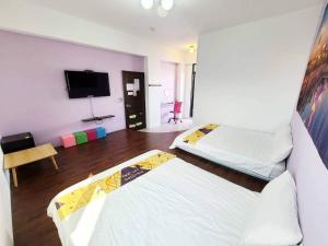 Postelja oz. postelje v sobi nastanitve New Summer Homestay