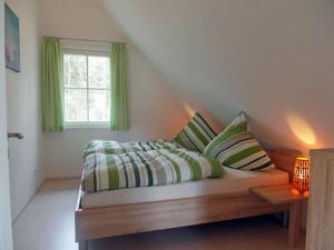 Voodi või voodid majutusasutuse Dune 8 Comfortable holiday residence toas