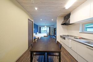 Dapur atau dapur kecil di NISEKO VILLA kiraku HOU 車利用にオススメ 各スキー場迄車で約15分 +46 gambar