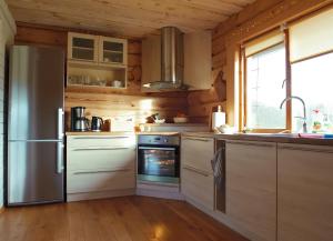 Kuchyň nebo kuchyňský kout v ubytování Rootsimaa Holiday House