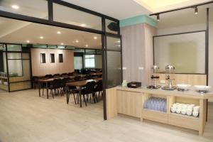 Restoran või mõni muu söögikoht majutusasutuses Hoya Resort Hotel Chiayi