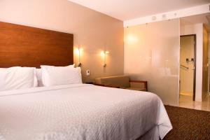 Letto o letti in una camera di Four Points by Sheraton Queretaro Norte