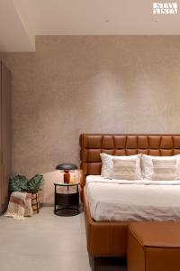 Letto o letti in una camera di StayVista at Sol & Sands with Mountain View and Pool