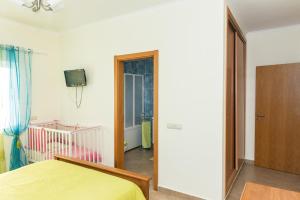 Postel nebo postele na pokoji v ubytování Moradia Malhao