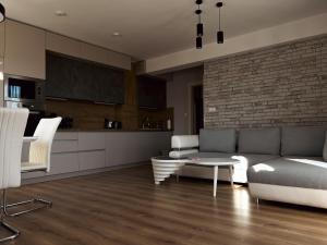 a living room with a couch and a table at Dariq in Kazanlŭk