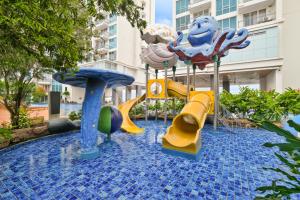 a water park with a playground with slides and rides at Arcus by Kozystay - Ancol in Jakarta