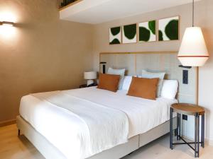 Postel nebo postele na pokoji v ubytování Tradere Hotel Boutique