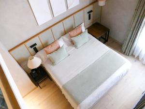 Postel nebo postele na pokoji v ubytování Tradere Hotel Boutique