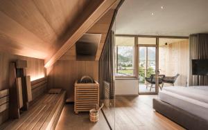 Voodi või voodid majutusasutuse Excelsior Dolomites Life Resort toas