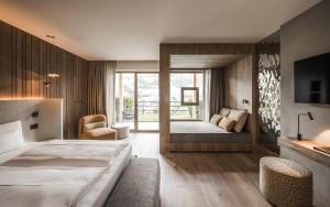Voodi või voodid majutusasutuse Excelsior Dolomites Life Resort toas