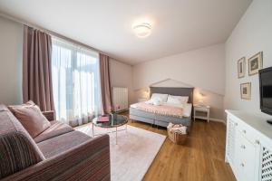 Łóżko lub łóżka w pokoju w obiekcie Hotel Sonnalm - SPA,Idyll,Dining