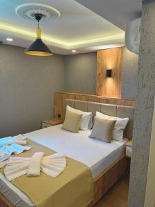 Postel nebo postele na pokoji v ubytování Yellow Bull Istanbul hotel