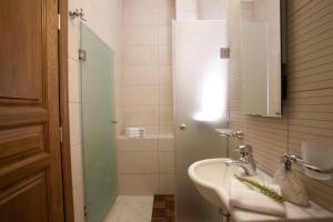 חדר רחצה ב-Villa Veneziano Suites & Villa