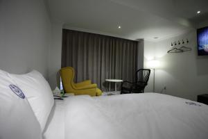 Postel nebo postele na pokoji v ubytování Hillside Hotel