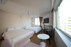 Postel nebo postele na pokoji v ubytování Hillside Hotel