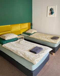 Posteľ alebo postele v izbe v ubytovaní Bemma Apart Hostel