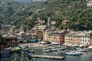 a city with boats in the water and buildings at Villa Peninsula in Portofino