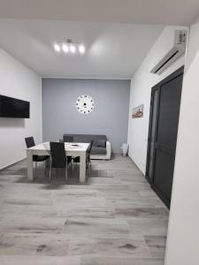 TV a/nebo společenská místnost v ubytování Casa vacanza La rosa dei venti + 21 fotografií