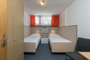 Ένα ή περισσότερα κρεβάτια σε δωμάτιο στο Chalet Pfiff